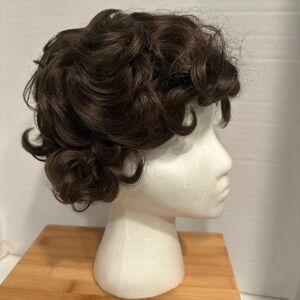 Elura Curly Brown Women's Wig. Modacrylic Fiber Short Curly Brown